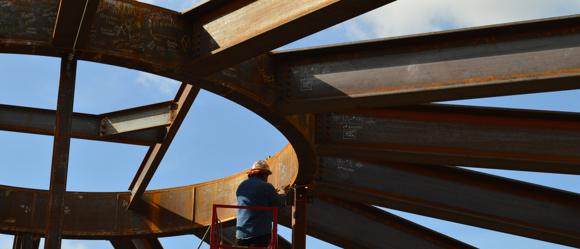 Steel beam radius with worker